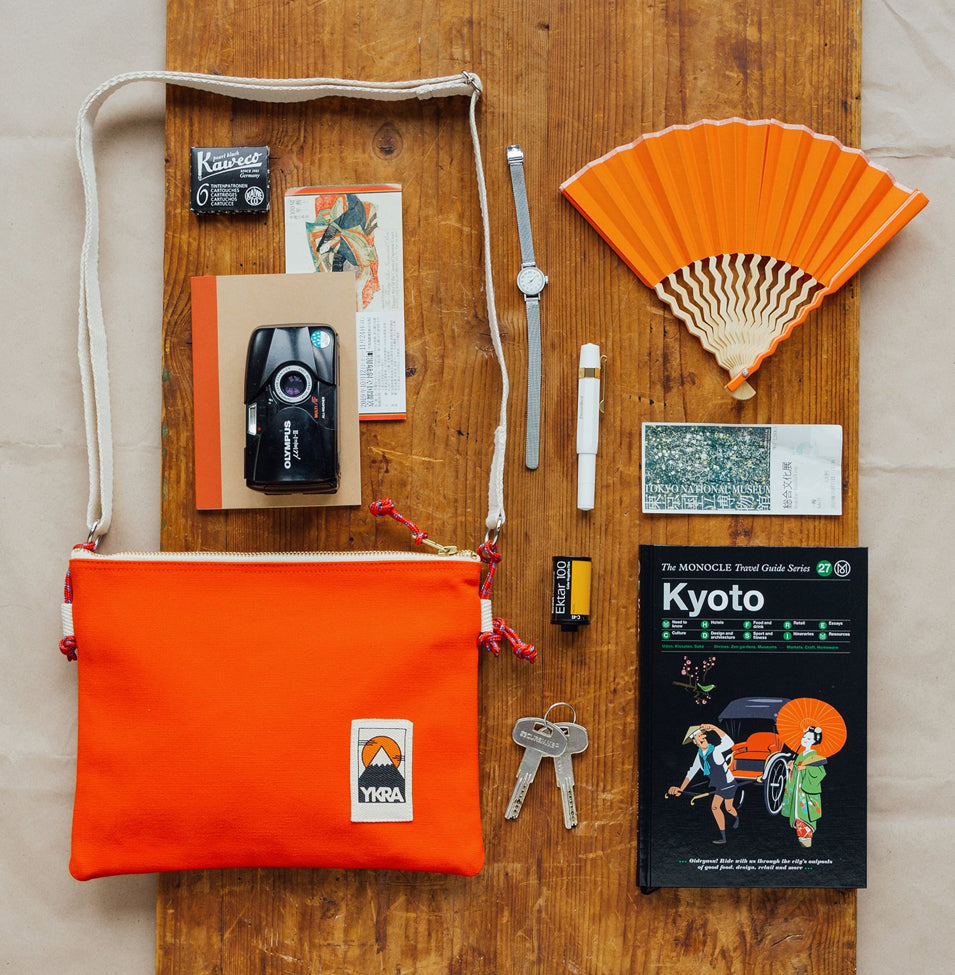 Ykra Orange Side Pouch